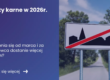 Grafika prezentująca z lewej strony tytuł artykułu: Punkty karne w 2026r. Z prawej zdjęcie znaku drogowego koniec obszaru zabudowanego